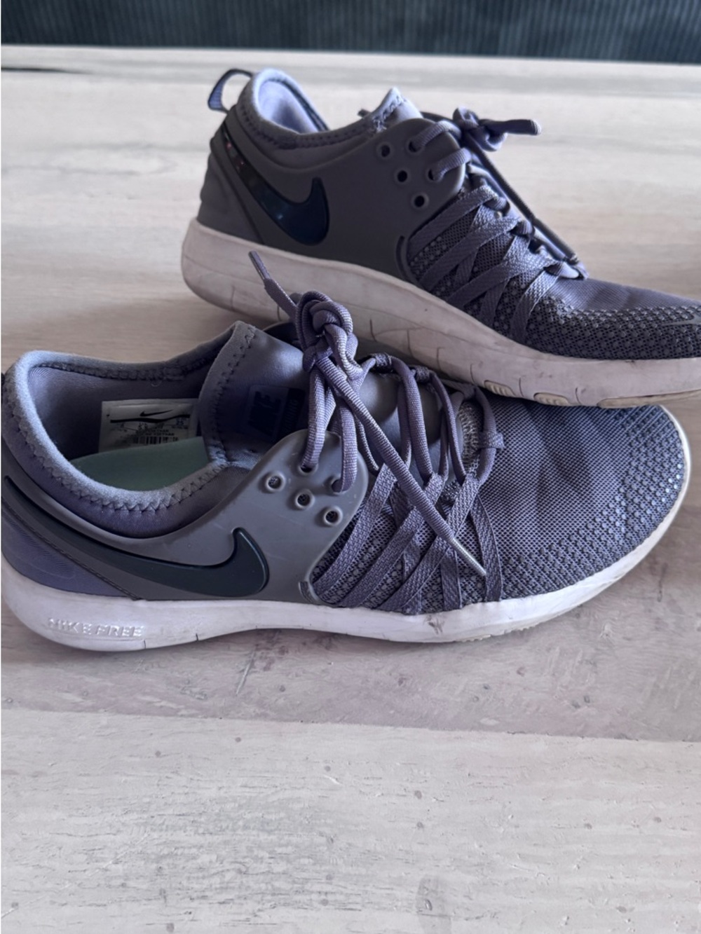 Women's Nike Free TR 7 training shoes in a gray and white colorway
